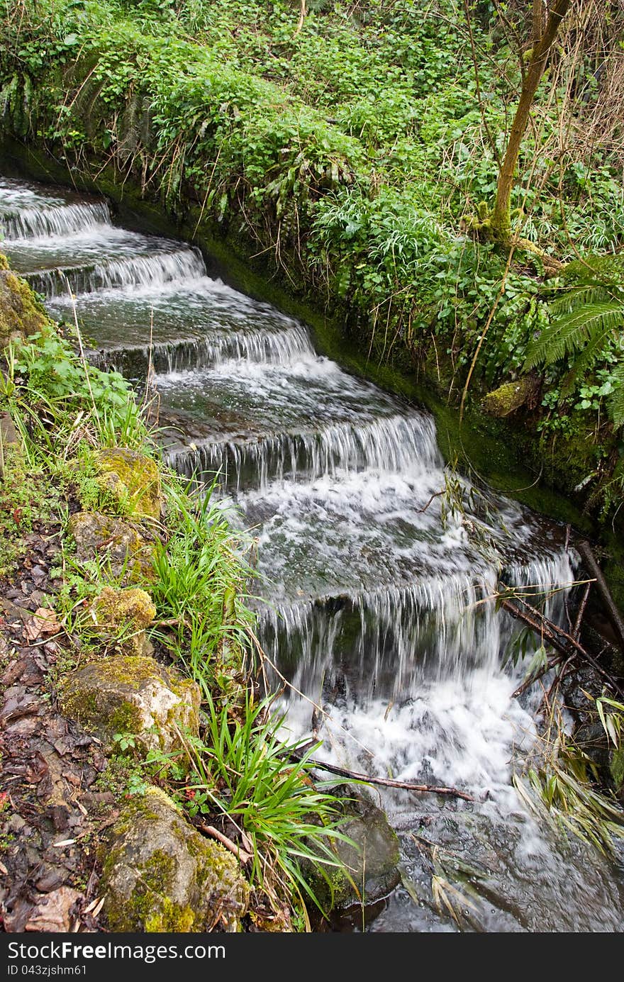 Cascade of water in Brockhill Park, Hythe, Kent