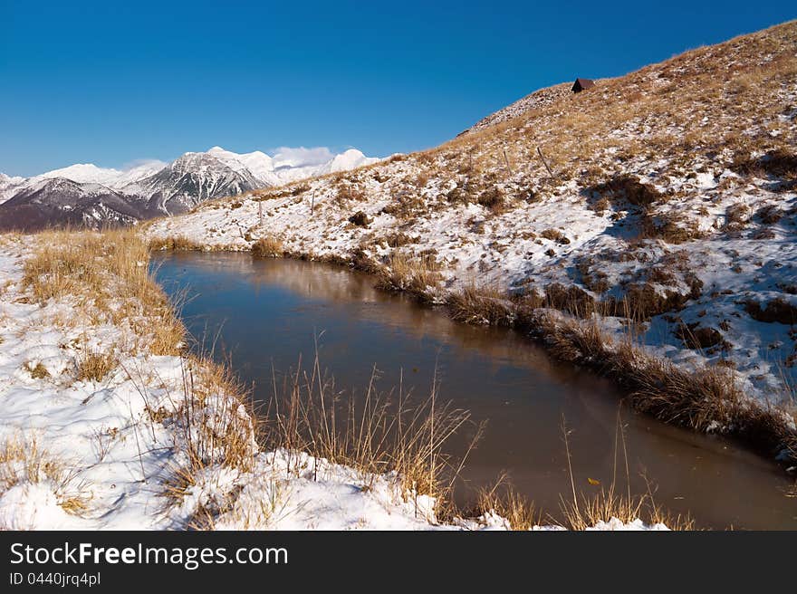 Frozen lake in the alps