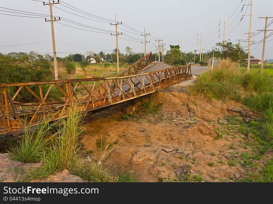 Temporary bridge is broken because the weight of the truck. Temporary bridge is broken because the weight of the truck.