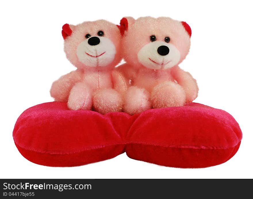 Two teddy bears sit on the heart. Two teddy bears sit on the heart.