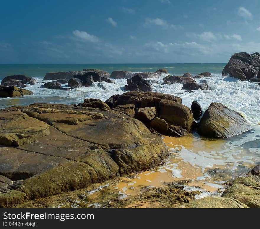 Ocean Wave Crashes Rock