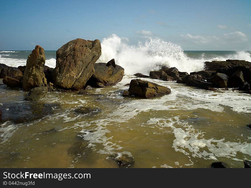 Ocean Wave Crashes Rock