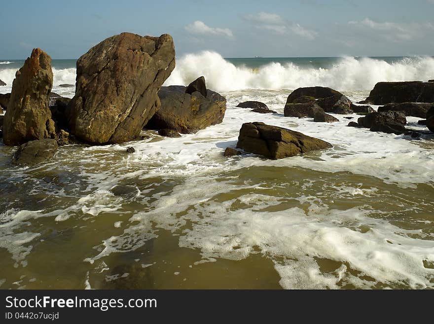 Ocean Wave Crashes Rock