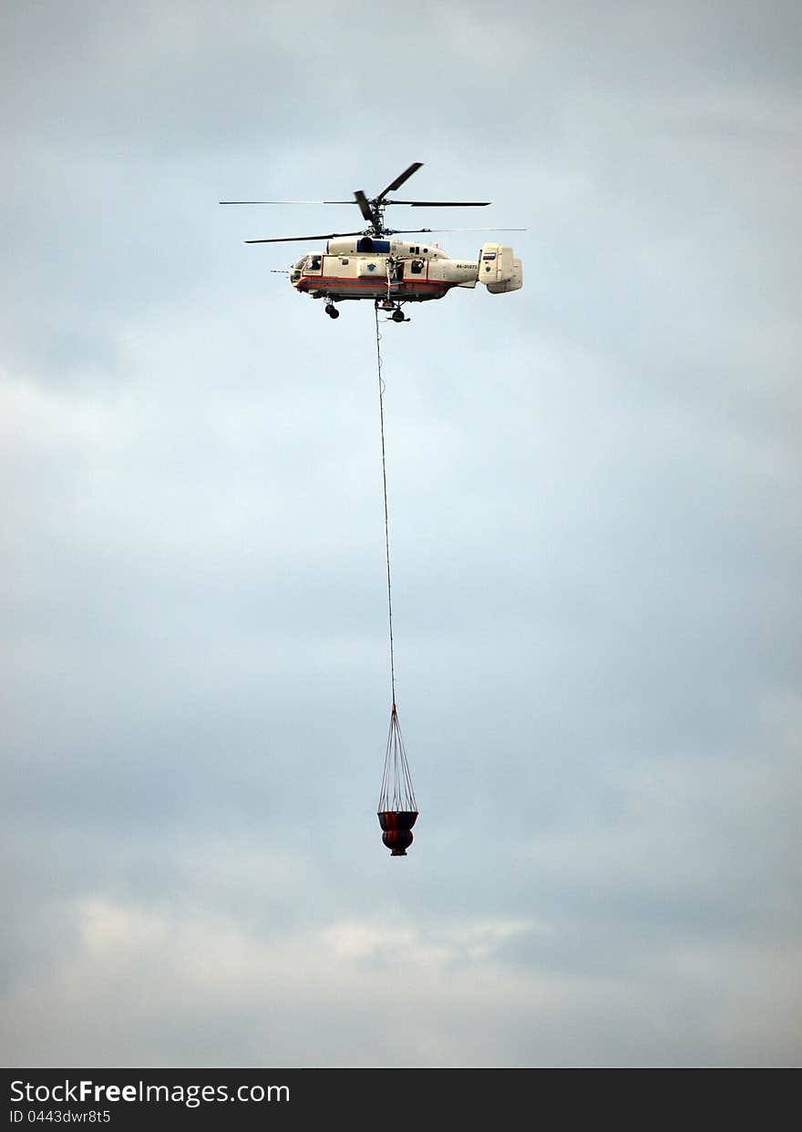 Helicopter fighting fire