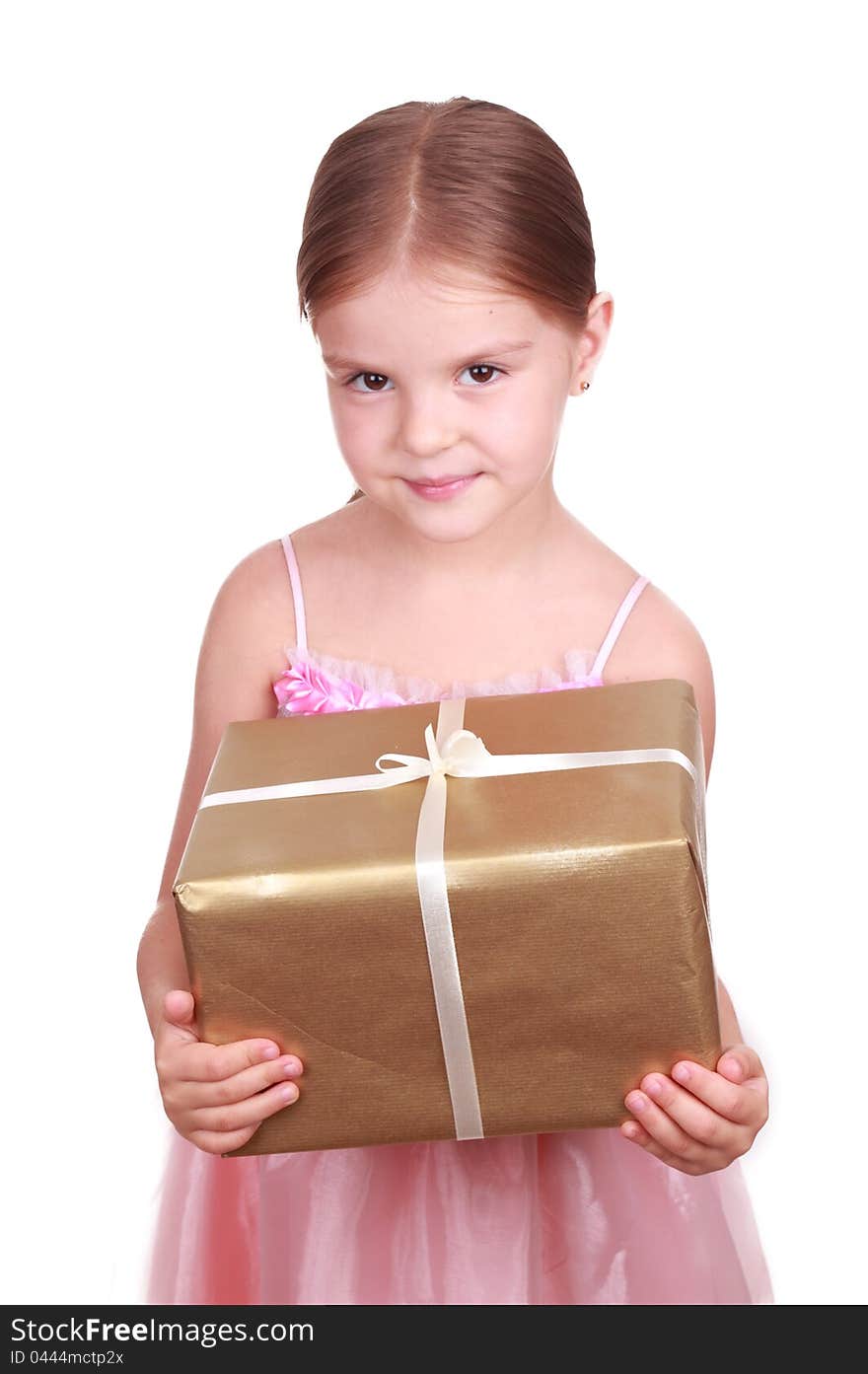 Little girl holding and offering a gift for some holiday over white background. Little girl holding and offering a gift for some holiday over white background