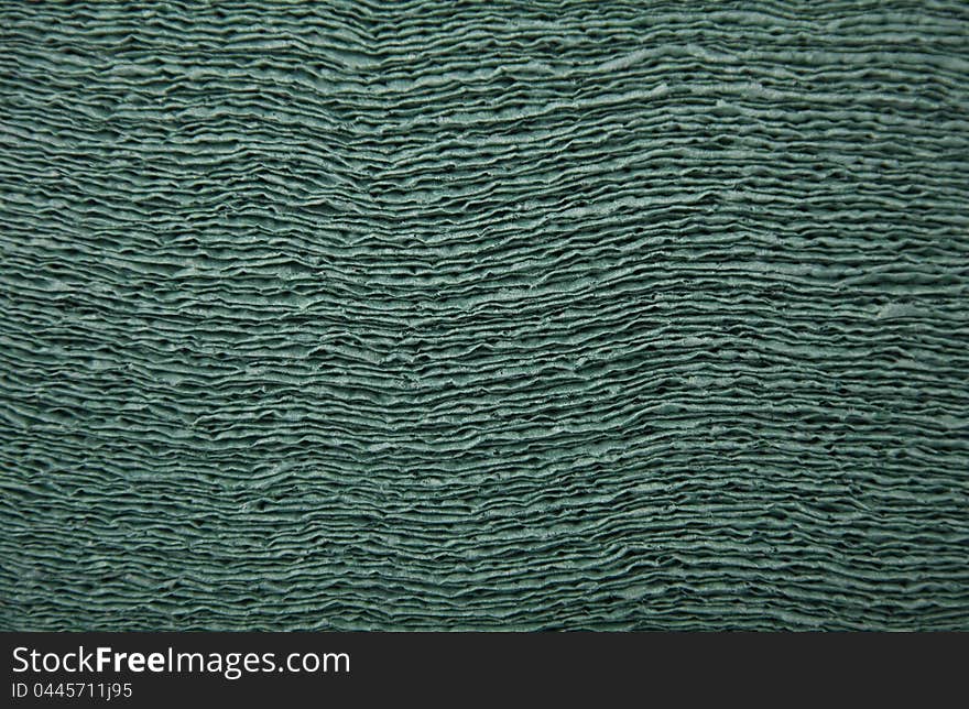 Photo of green pressed napkins texture. Photo of green pressed napkins texture