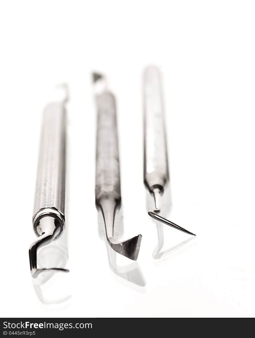 Set of metal medical equipment tools for teeth dental care. Set of metal medical equipment tools for teeth dental care