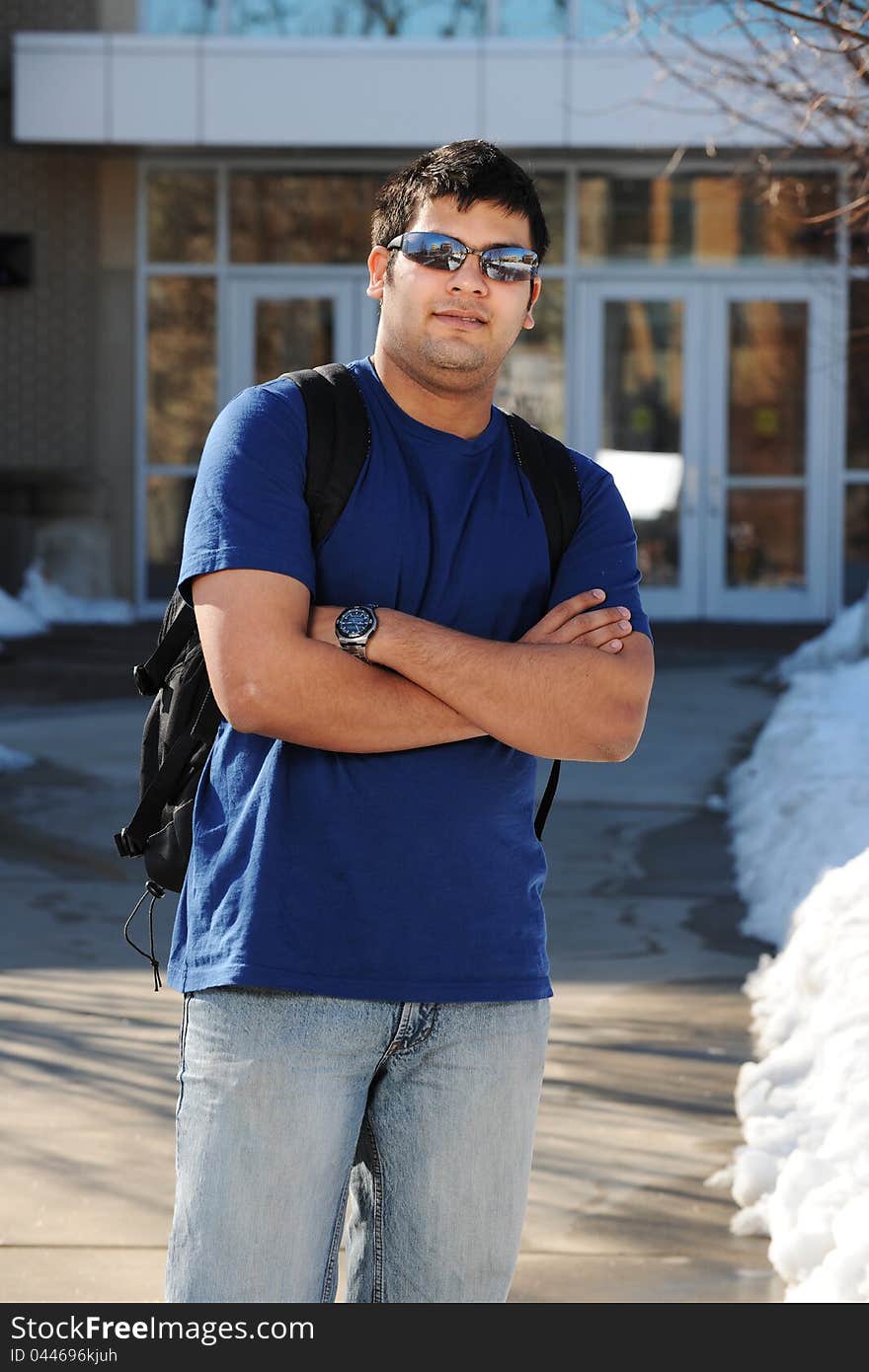 Young Eastern College Student in school campus