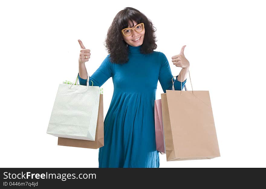 A happy shopping woman isolated over white background