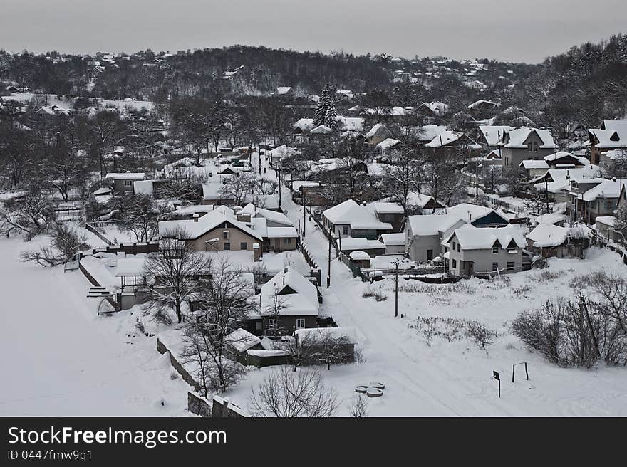 Village in winter with snow