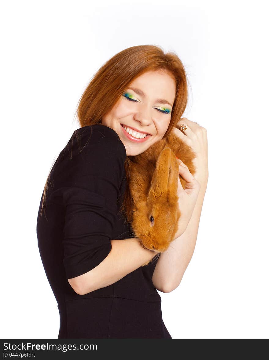 Portrait of a young beautiful woman with foxy hair