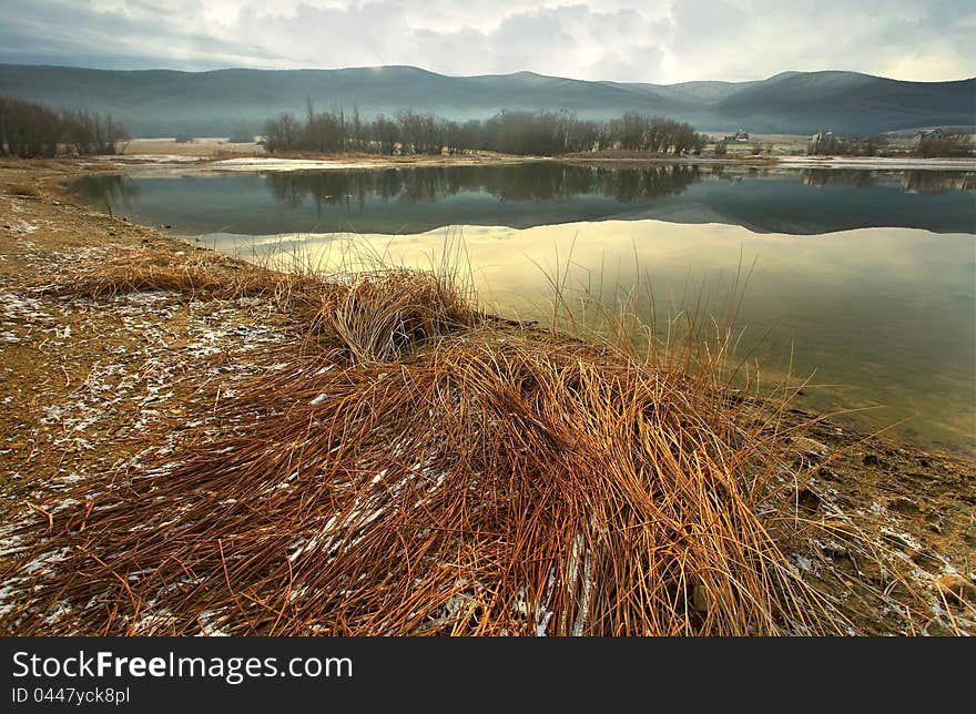 Autumn Landscape with a lake and mountain