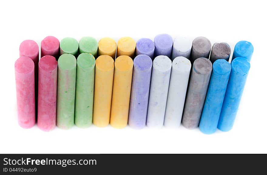 Box with children's crayons on a white background. Box with children's crayons on a white background