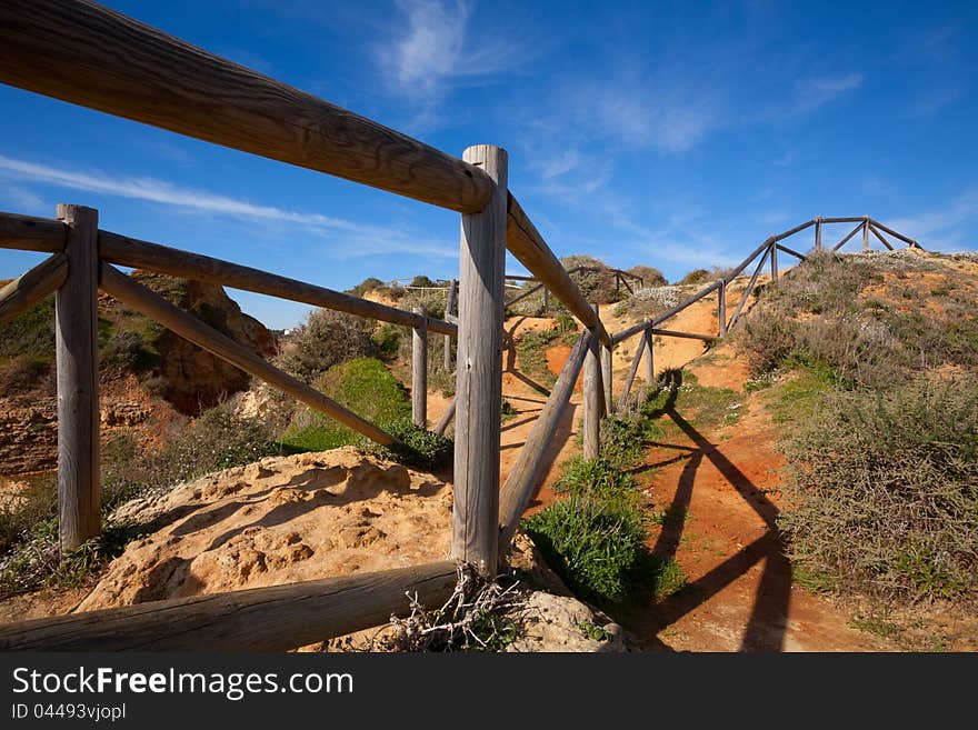 Wooden railings on the cliff