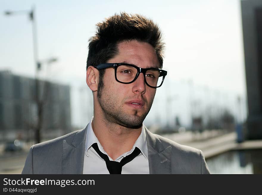 Portrait of a handsome young businessman smiling. Portrait of a handsome young businessman smiling