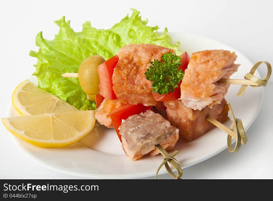 Close up of grilled salmon with vegetables