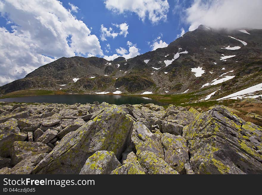 Beautiful cloud scenery in the Alps in summer in dramatic light. Beautiful cloud scenery in the Alps in summer in dramatic light