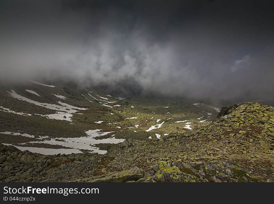 Dramatic storm cloud scenery in high mountains