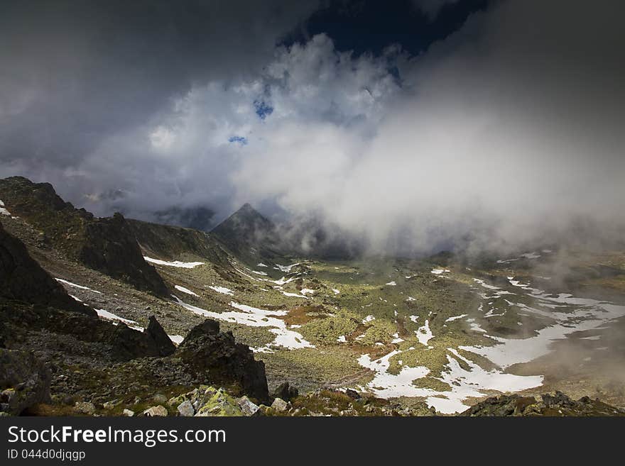 Dramatic cloud scenery in high mountains