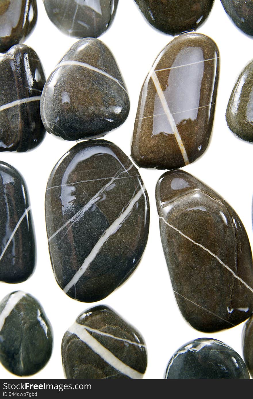 Pebbles black rock with white inner strip. Pebbles black rock with white inner strip