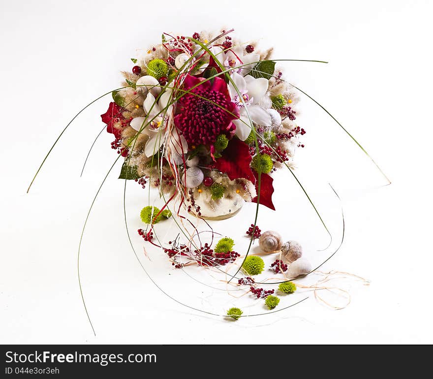 Beautiful flower arrangements for winter, spring, summer and autumn with colored backgrounds of red, purple and wintry white. Beautiful flower arrangements for winter, spring, summer and autumn with colored backgrounds of red, purple and wintry white