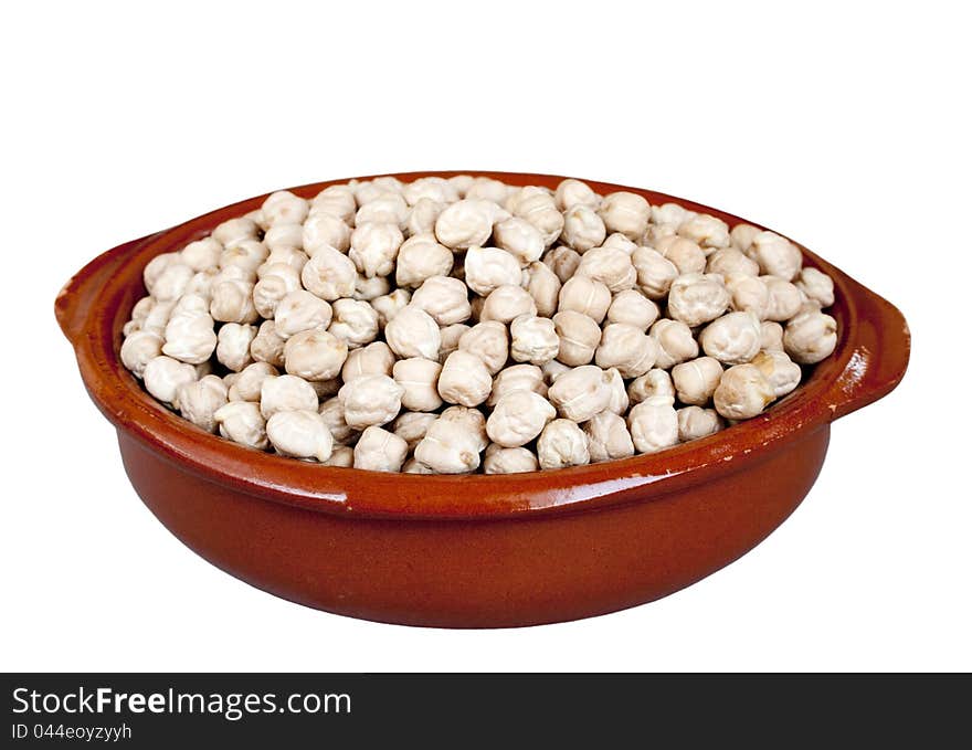 Chickpeas in ceramic bowl isolated over white background