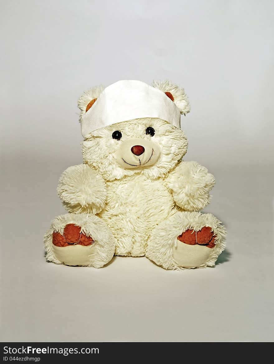 A white colored plush bear for medical themes. A white colored plush bear for medical themes.