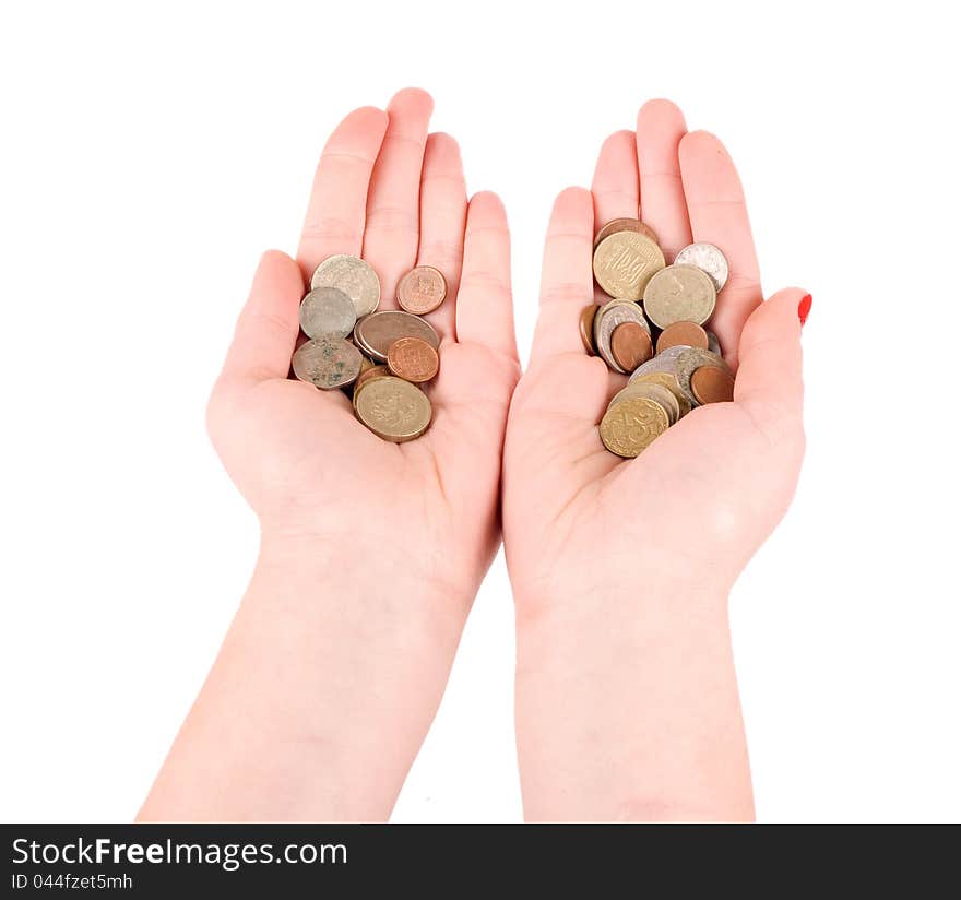 Hands holding many coins isolated on white