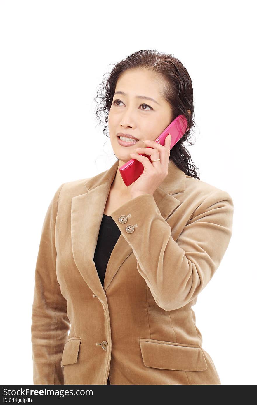 Asian business woman calling by cellular phone