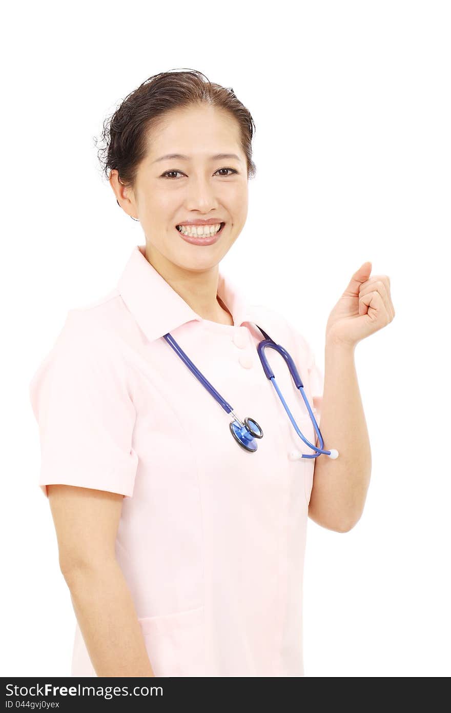 Portrait of a asian female nurse showing arm