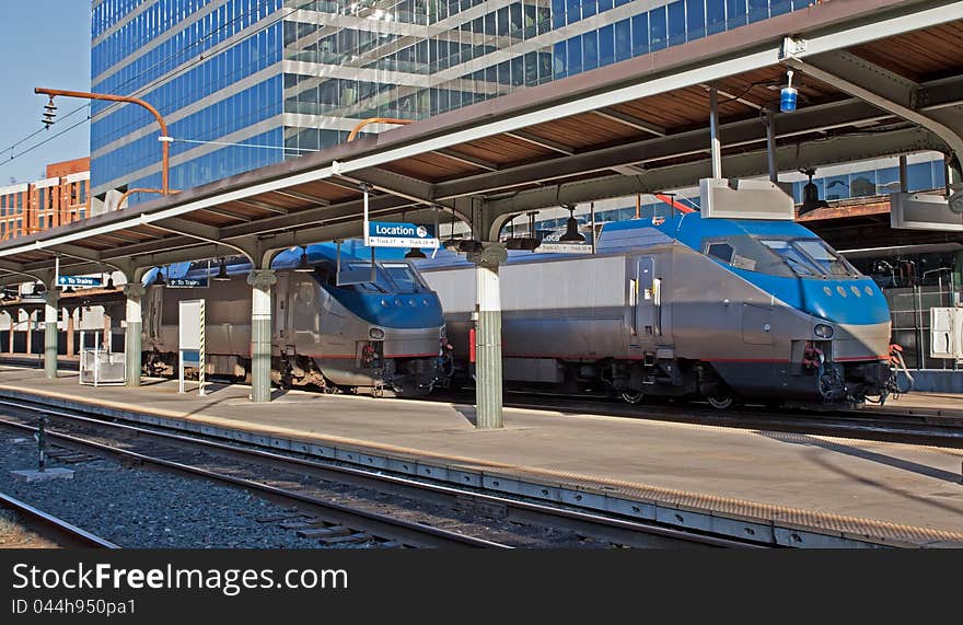 Passenger trains at an old railway station in the city. Passenger trains at an old railway station in the city.