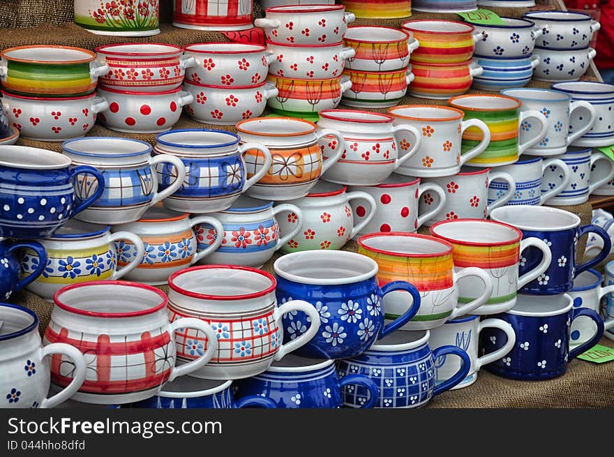 Many colorful handmade ceramic cups on the market. Many colorful handmade ceramic cups on the market