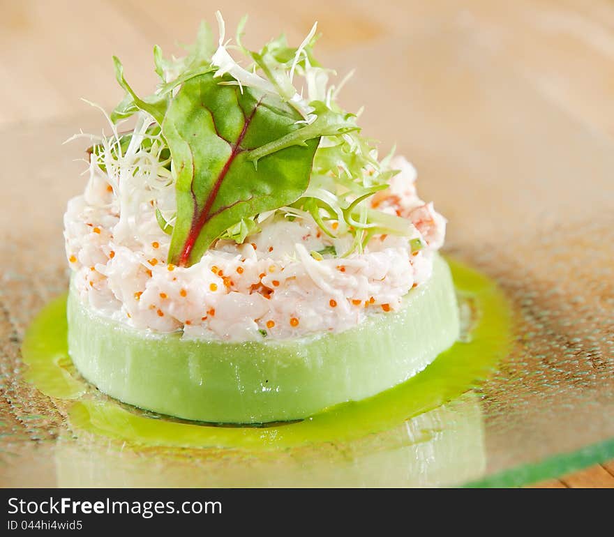 Mashed potato with caviar souffle, on glass plate, served for restaurant