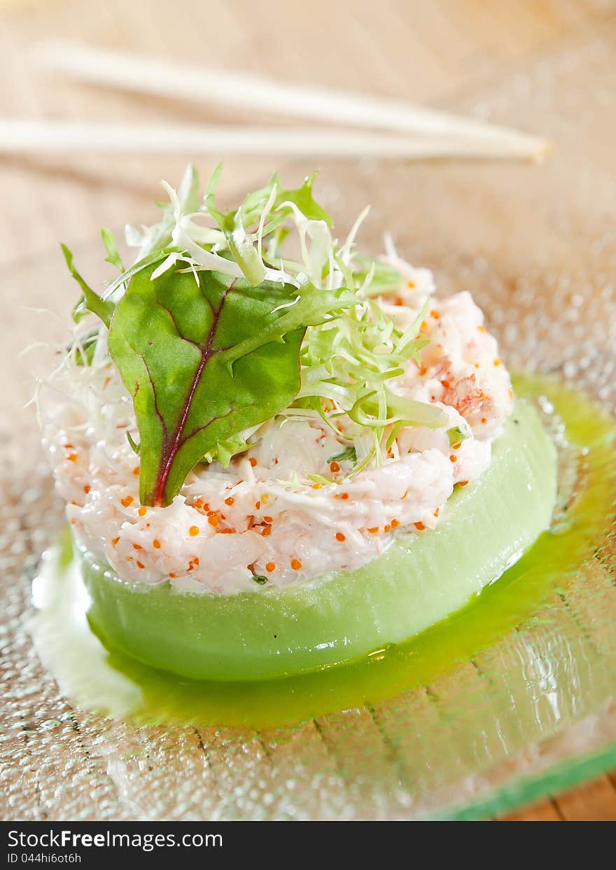 Mashed potato with caviar souffle, on glass plate, served for restaurant