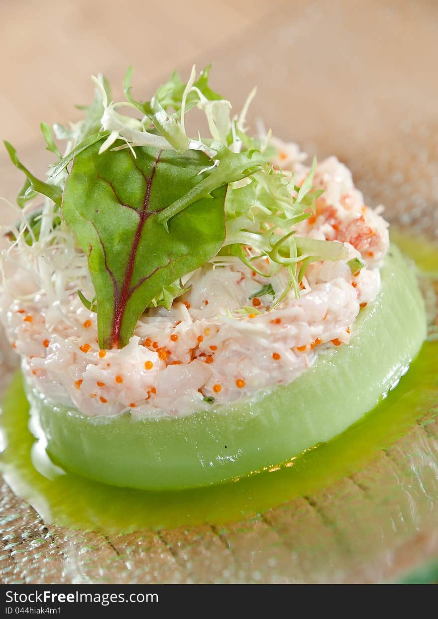 Mashed potato with caviar souffle, on glass plate, served for restaurant