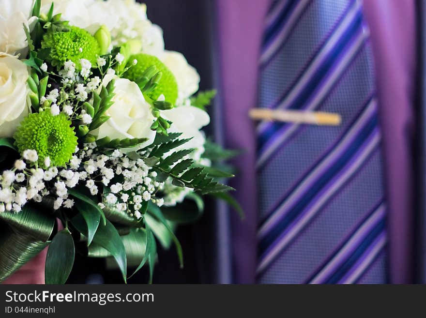 Man hold bouquet in hand. Man hold bouquet in hand