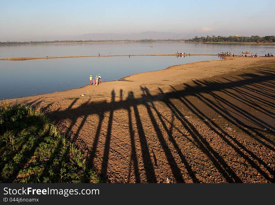 U Bein Bridge was built across Taungthaman Lake in the mid 1800’s out of teak posts. It’s said to be the longest teak bridge in the world at 1.2km long and is the sole link between Amarapura and Taungthaman village. Obviously an attraction, it’s also in heavy use by the locals including a stream of monks on their daily errands.