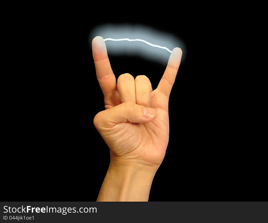 Electric discharge between fingers on a black background