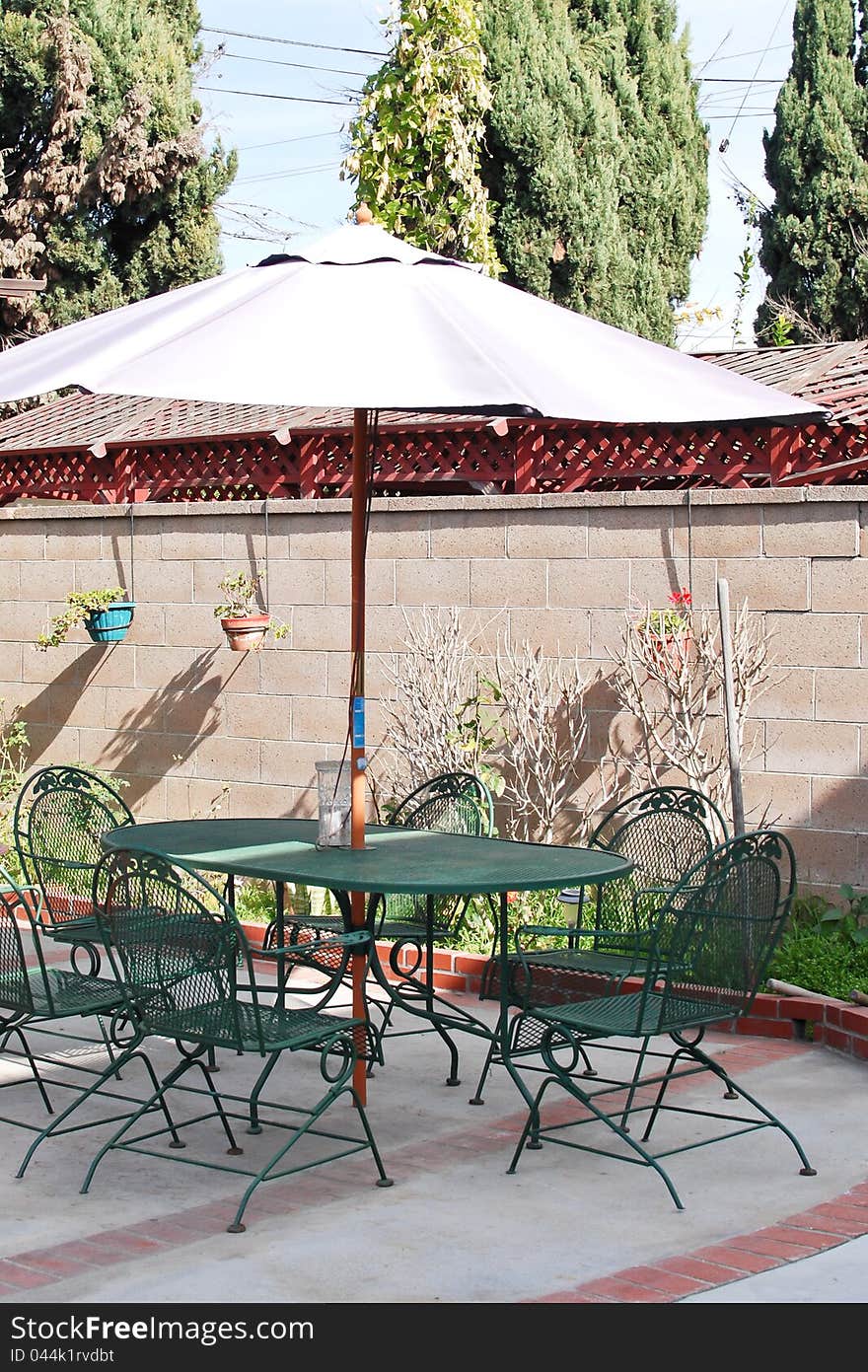 Fancy Umbrella and Table In Backyard. Fancy Umbrella and Table In Backyard