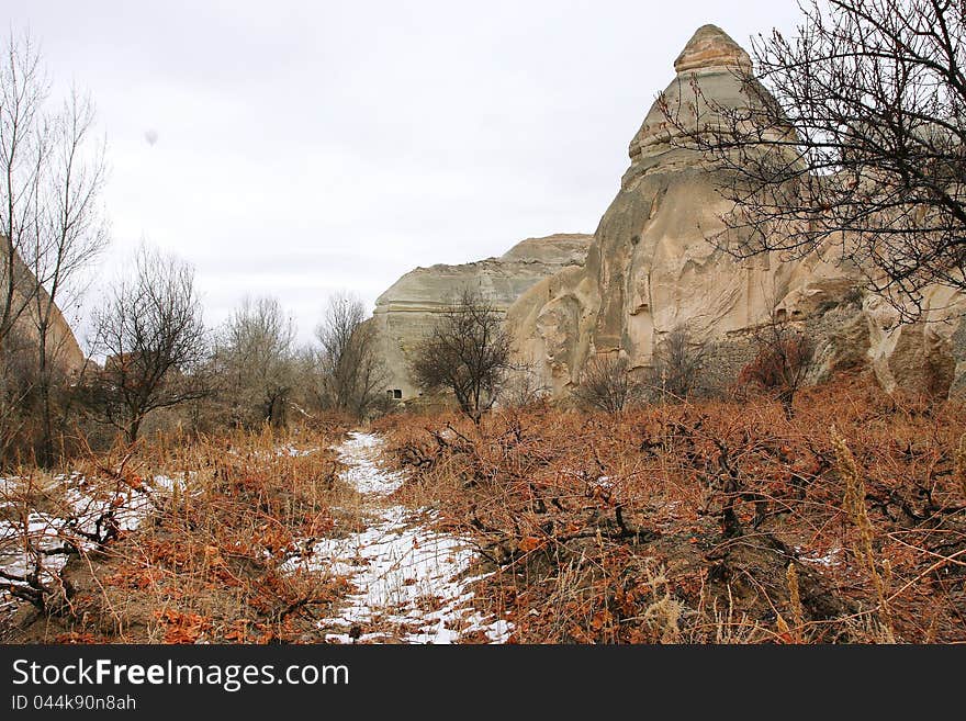 Rocks and the grape valley at the winter in Cappadocia, Turkey. Rocks and the grape valley at the winter in Cappadocia, Turkey.