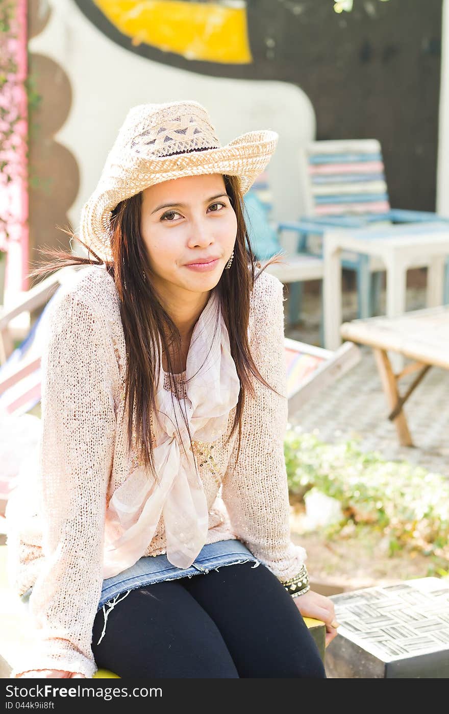 Attractive woman wearing hat for portrait