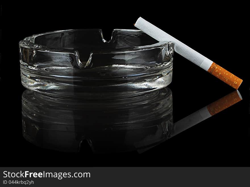 Cigarette And Glass Ashtray.