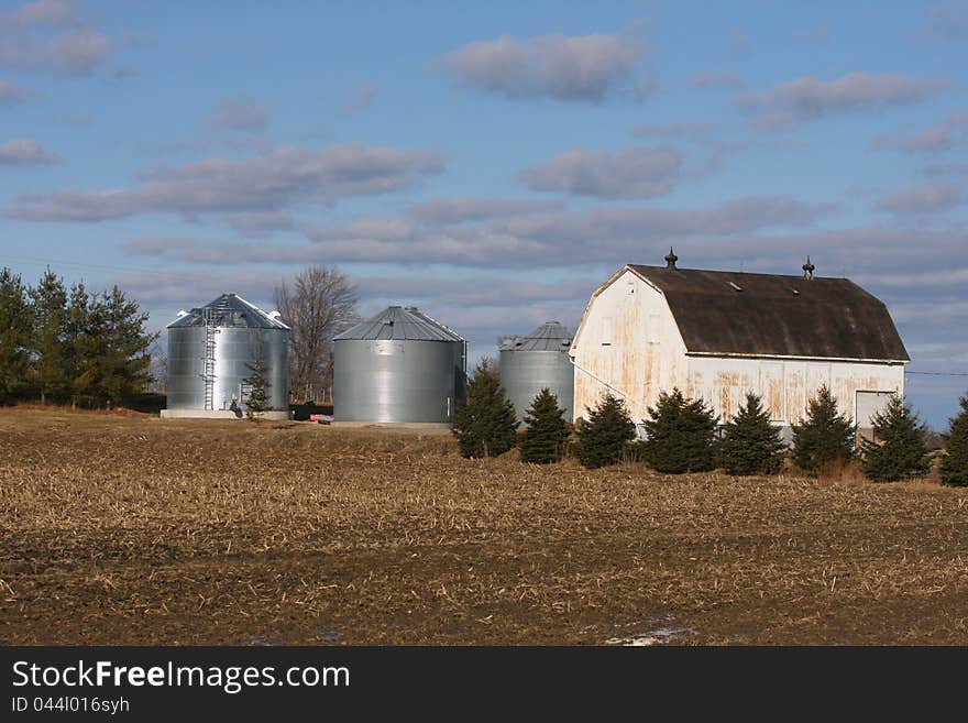 Old Barn in morning sun in winter