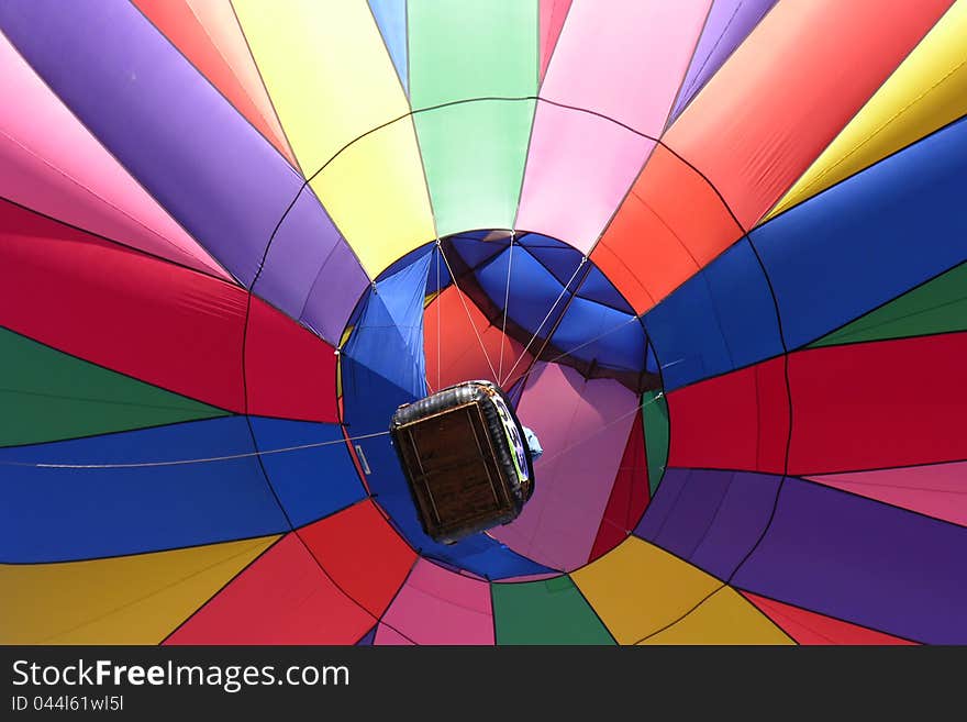 Rainbow colors create pattern from below the basket. Rainbow colors create pattern from below the basket.