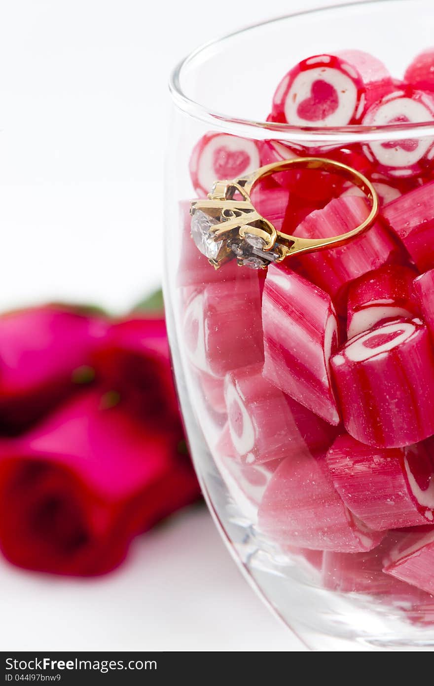 Diamond Ring and Candy in wine glass