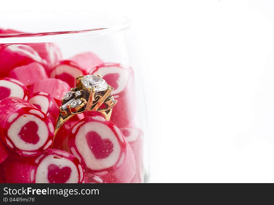 Diamond Ring and Candy in wine glass