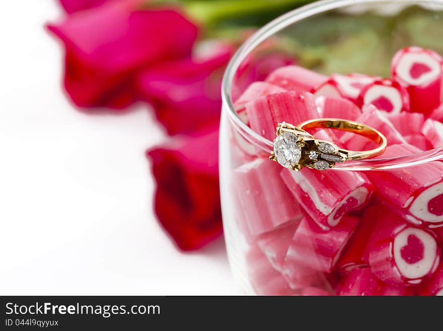 Diamond Ring and Candy in wine glass