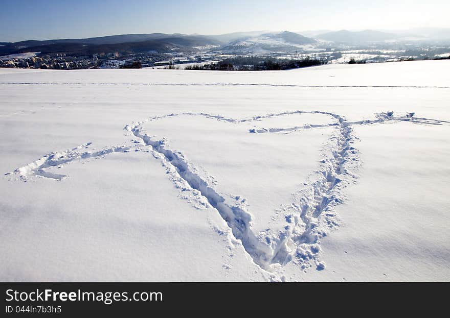 White snow with heart shape