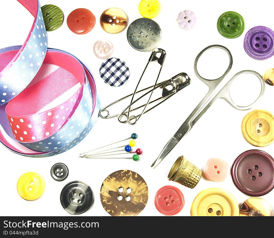 Sewing Buttons and tailor accessory on a white background. Sewing Buttons and tailor accessory on a white background