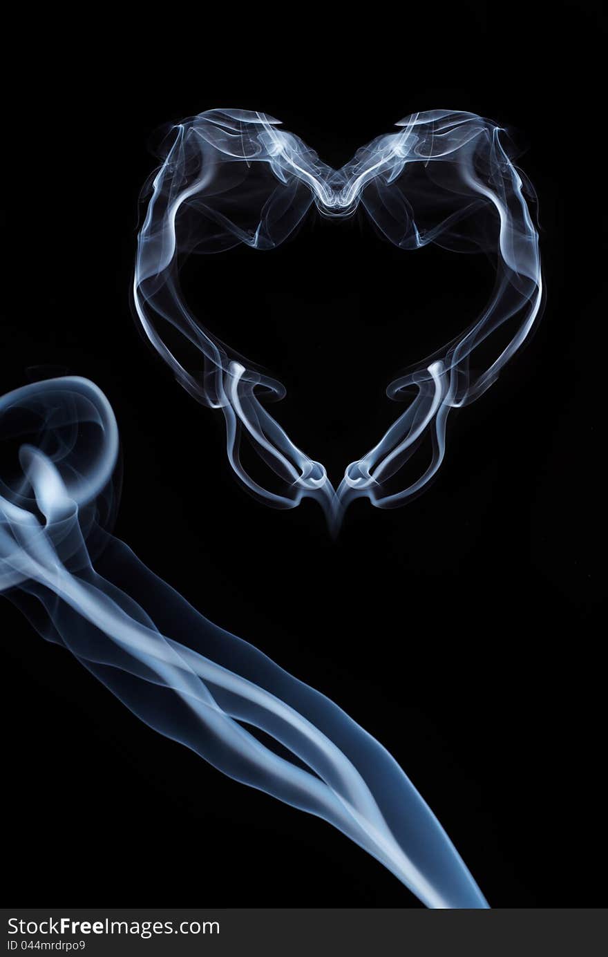 Smoke heart as a symbol of fragile nature of love. Smoke heart as a symbol of fragile nature of love